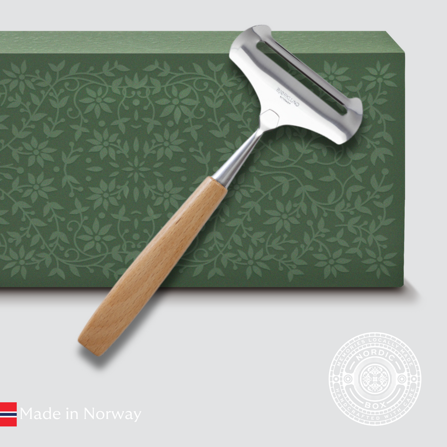 Authentic Norwegian-made traditional cheese slicer. A nostalgic ostehøvel crafted for clean, thin slices and timeless Scandinavian style.