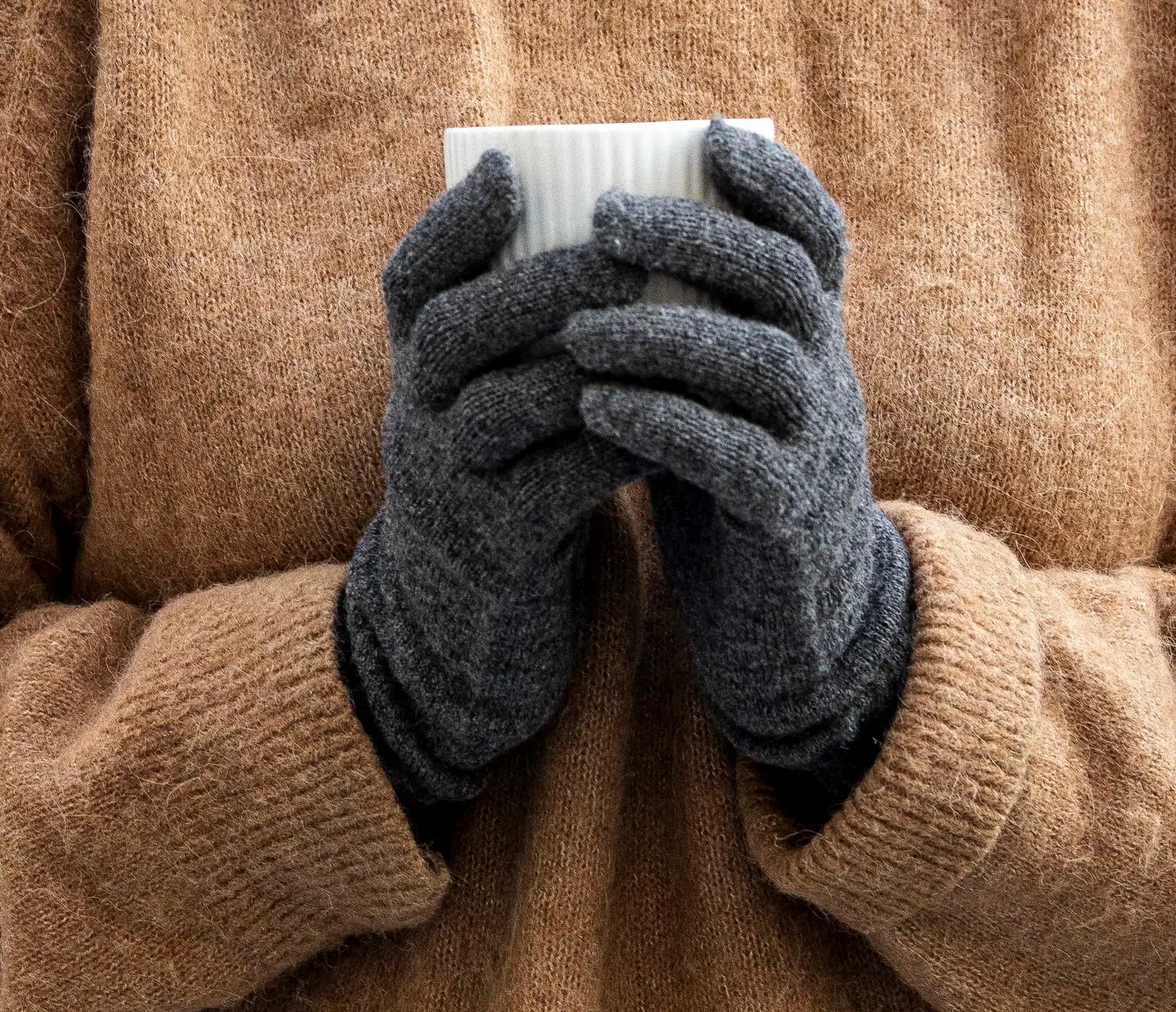 Alpaca is known for its durability and ability to keep its shape. With proper care, your gloves will remain soft and beautiful for years. A gentle cold-water hand wash is all they need.